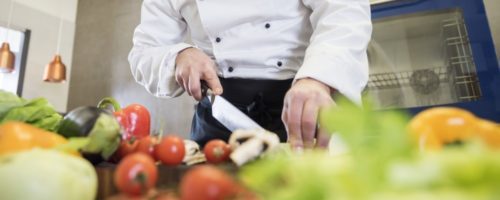 close-up-on-chef-cooking-in-restaurant-kitchen (1)